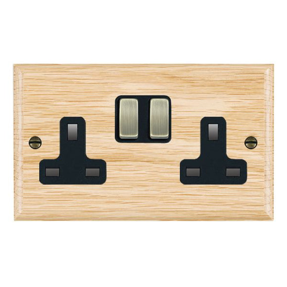 Hamilton WOLSS2AB-B Woods Ovolo Light Oak 2 gang 13A Double Pole Switched Socket Antique Brass/Black Insert