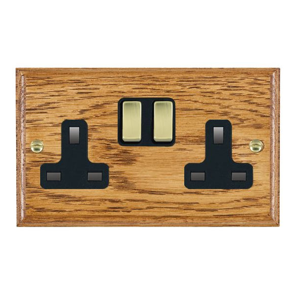 Hamilton WOMSS2PB-B Woods Ovolo Medium Oak 2 gang 13A Double Pole Switched Socket Polished Brass/Black Insert