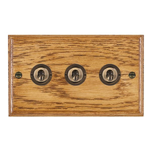 Hamilton WOMT23AB Woods Ovolo Medium Oak 3 gang 20AX 2 Way Toggle Antique Brass Insert